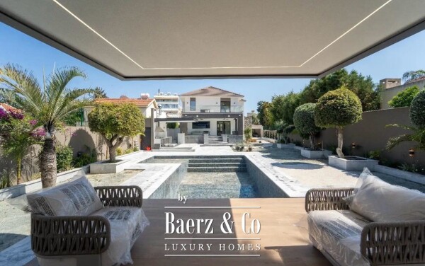 photo 1 Live Steps from the Sea: Brand-New Designer Mansion with Pool, Gym & Smart Home
